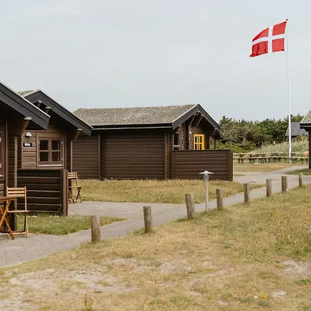 A Small Wooden Hut In A Large Community Ulfborg