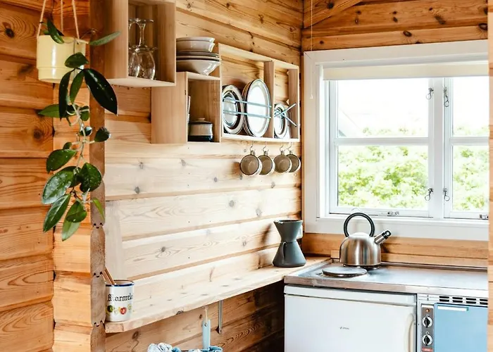 A Small Wooden Hut In A Large Community Dom wakacyjny Ulfborg